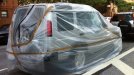 Land Rover wrapped in plastic.jpg