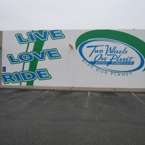 two wheels one planet mural